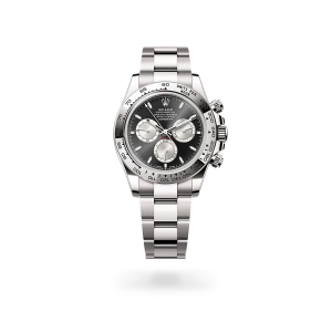 Rolex Cosmograph Daytona in white gold with black and steel dial, fixed bezel, and Oyster bracelet - Crisson