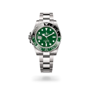 Rolex GMT-Master II in white gold with a green ceramic dial, bidirectional rotatable 24-hour graduated  bezel, and Oyster bracelet - Crisson