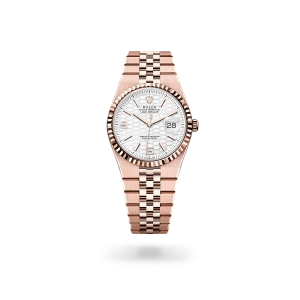 Rolex Land-Dweller 36 in Everose gold with an intense white dial, fluted bezel, and flat Jubilee bracelet - Crisson