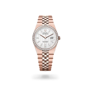 Rolex Land-Dweller 36 in Everose gold and diamonds with an intense white dial, fluted bezel, and flat Jubilee bracelet - Crisson