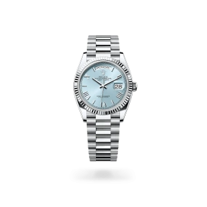 Rolex Day-Date 36 in platinum with an ice blue dial, fluted bezel, and President bracelet - Crisson