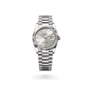 Rolex Day-Date 36 in white gold with a silver dial, fluted bezel, and President bracelet - Crisson
