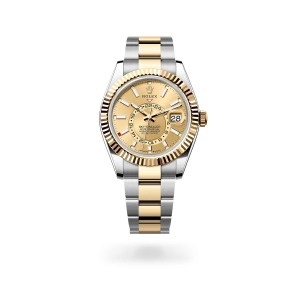 Rolex Sky-Dweller in Oystersteel and yellow gold with a champagne-colour dial, fluted bezel, and Oyster bracelet - Crisson
