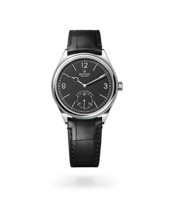 Rolex 1908 in white gold with an intense black dial, domed and fluted bezel, and leather bracelet -  Crisson