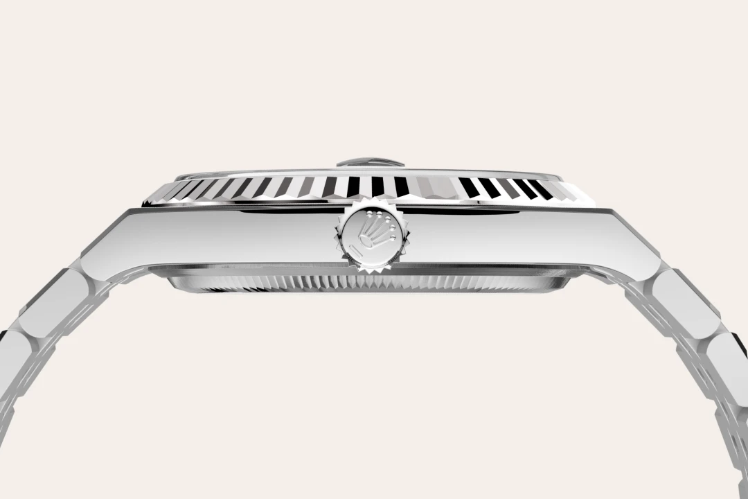 Rolex Land-Dweller 40 in Oystersteel and white gold with an Intense white dial, fluted bezel, and flat Jubilee bracelet, m127334-0001 - Crisson