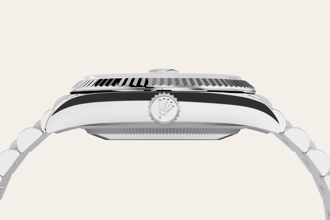 Rolex Day-Date 36 in platinum with an ice blue dial, fluted bezel, and President bracelet, m128236-0018 - Crisson