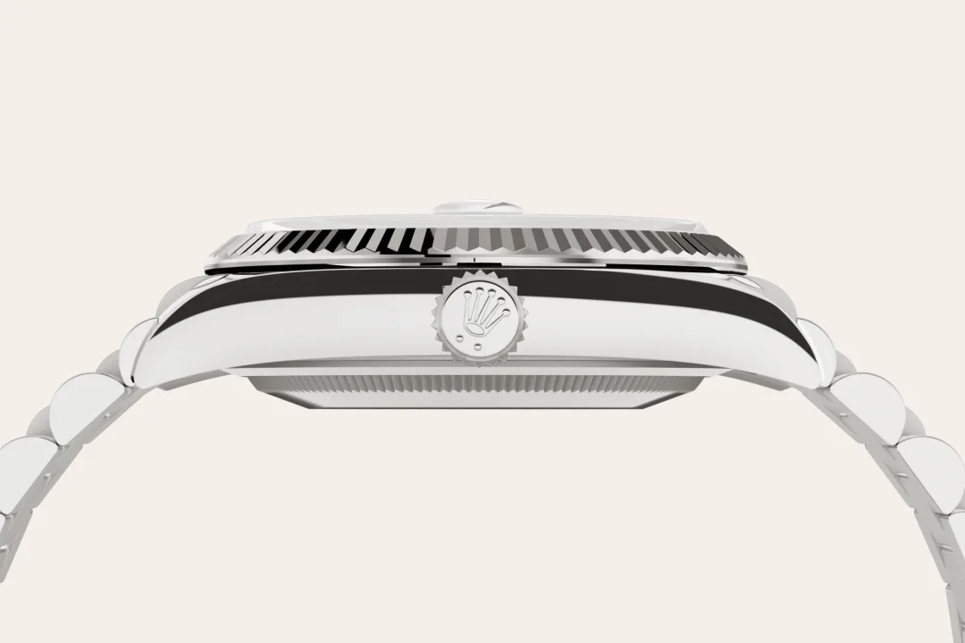 Rolex Day-Date 36 in white gold with a silver dial, fluted bezel, and President bracelet, m128239-0005 - Crisson